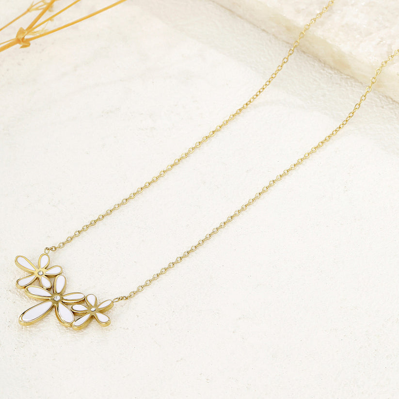 Collier chaîne triple fleurs