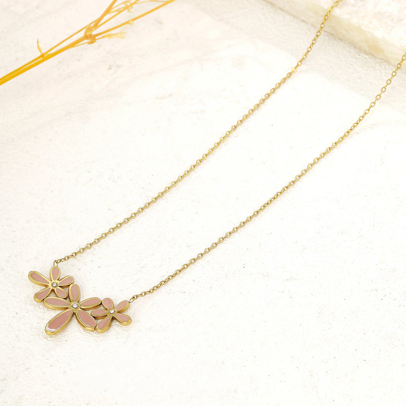 Collier chaîne triple fleurs