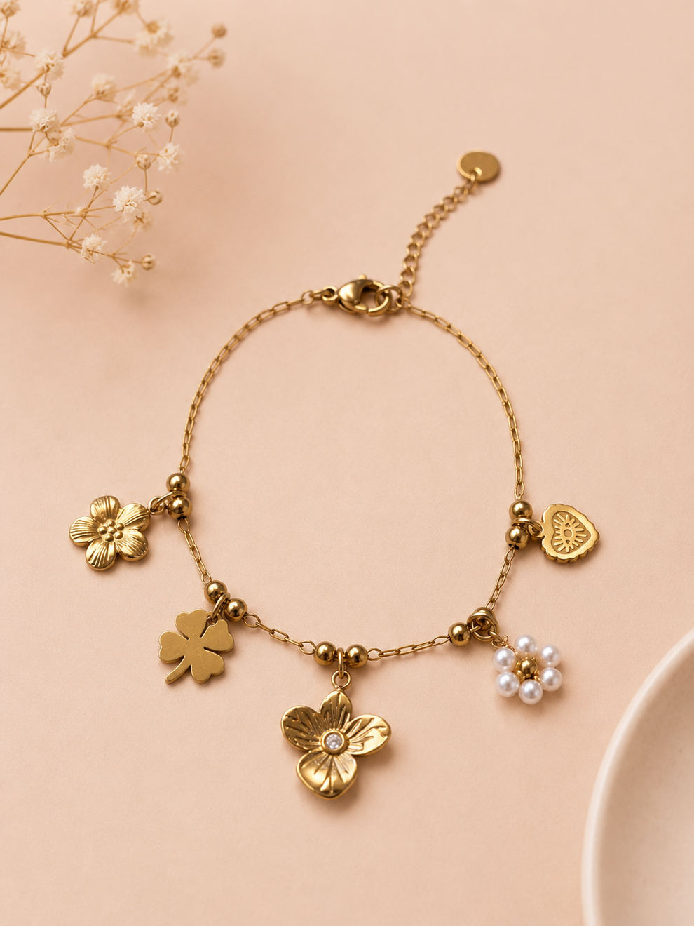 Bracelet doré à charms