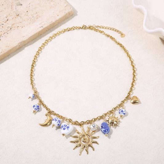 Collier charms et soleil