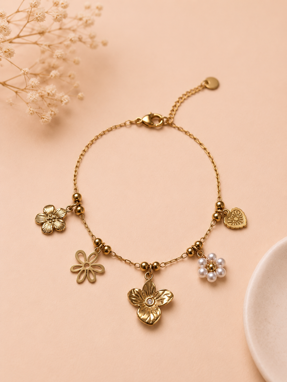 Bracelet doré à charms